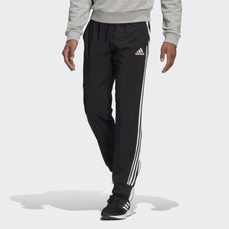 Теплые брюки Adidas Aeroready Essentials Tapered Cuff Woven черные